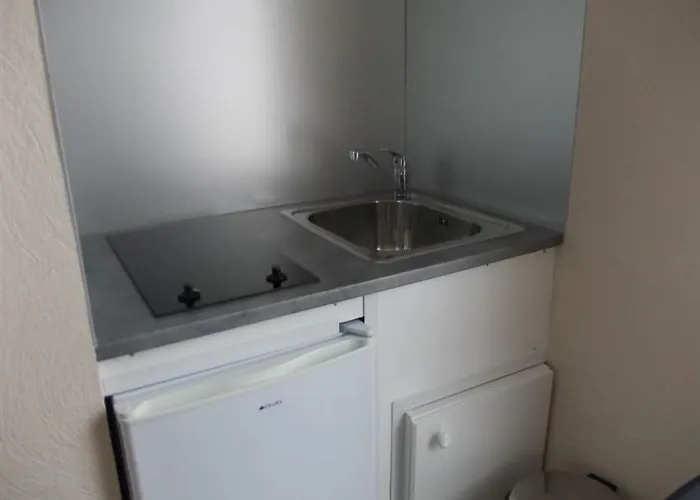 Des Quatre Saisons Отель